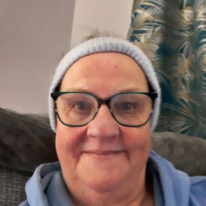 Sharon added a photo of their purchase