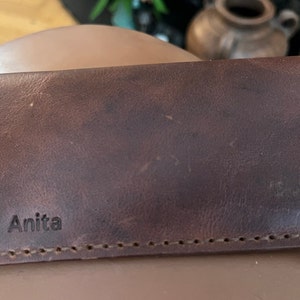 Anita added a photo of their purchase