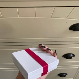 Alanna added a photo of their purchase