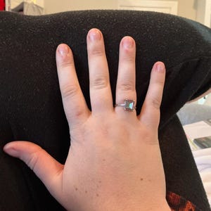 Sarah added a photo of their purchase