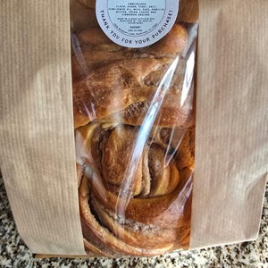 Elaine added a photo of their purchase