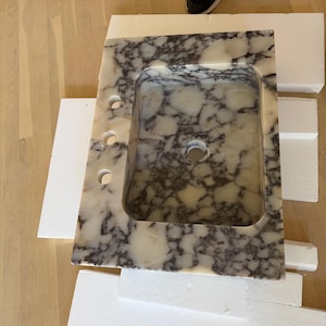 Nicola added a photo of their purchase
