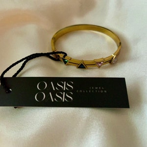 Tati added a photo of their purchase