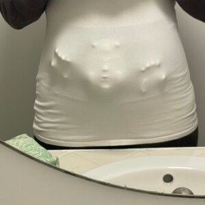 Baby coming out of stomach best sale costume