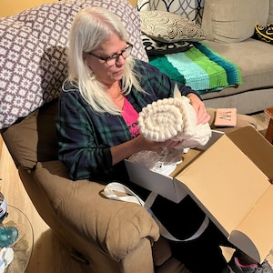 Sarah added a photo of their purchase
