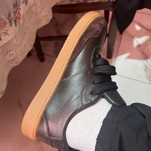 Ana added a photo of their purchase