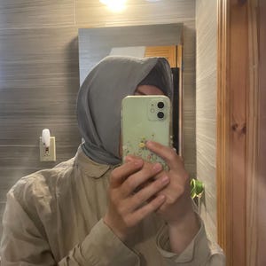 Aya added a photo of their purchase