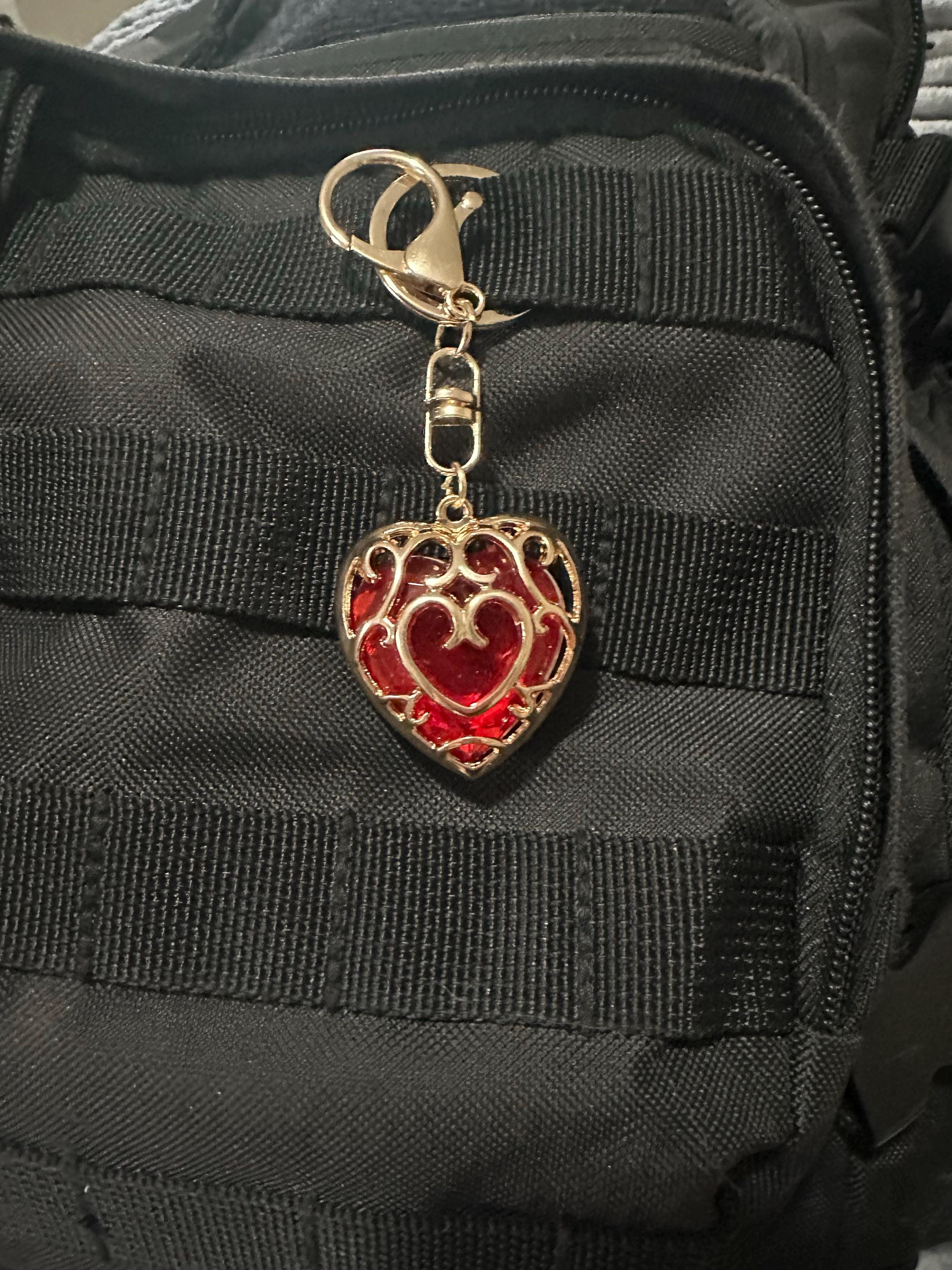 The legend of Zelda heart keychain, heart container, Royal Claymore, Royal Shield