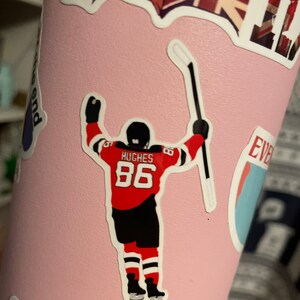 New Jersey Devils: Jack Hughes 2021 Poster - NHL Removable Adhesive Wall Decal Large