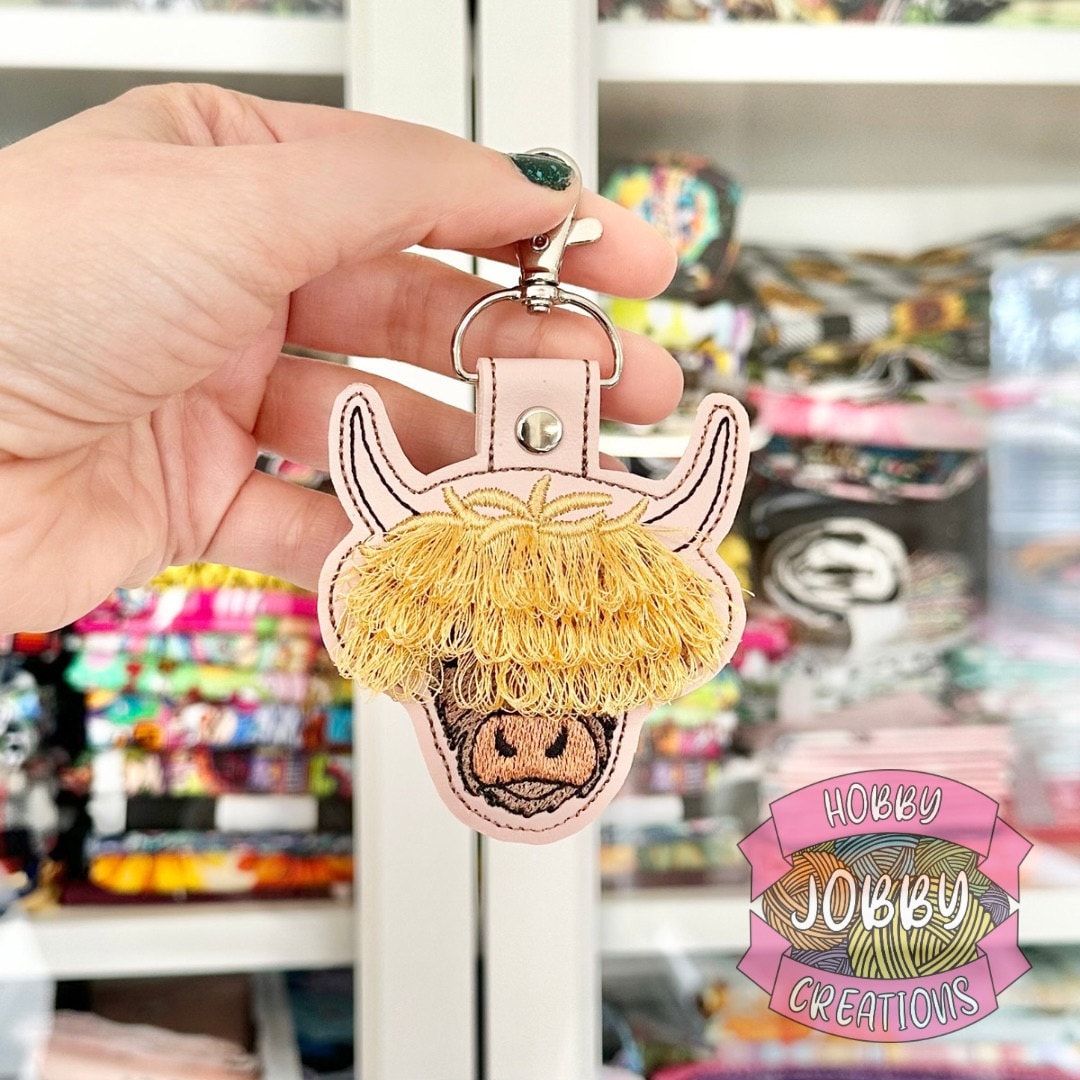 Fringed Highland cow keychain key fob snap tab in the hoop machine embroidery designs ITH project Awesome fluffy fur cow kids backpack tag