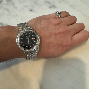 Constantine added a photo of their purchase