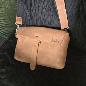 Saskia added a photo of their purchase
