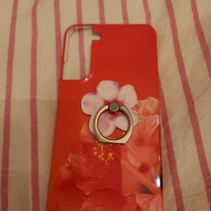 Aimee added a photo of their purchase