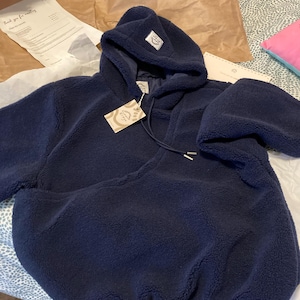 Anita added a photo of their purchase