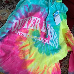 Caitlin added a photo of their purchase