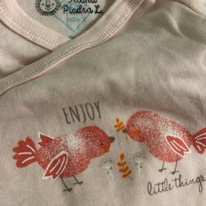 Giovanna added a photo of their purchase