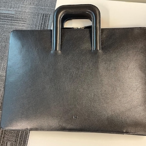 Vijaya added a photo of their purchase
