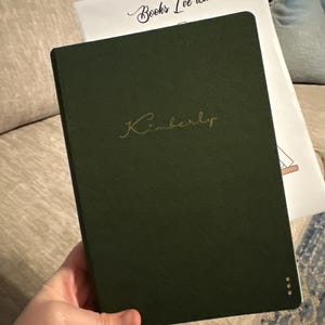 Kimberly added a photo of their purchase