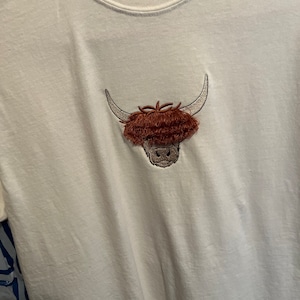 Sheryl added a photo of their purchase