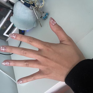 Angela added a photo of their purchase