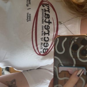 Katie added a photo of their purchase