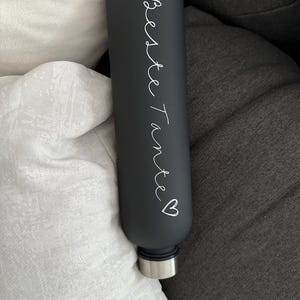 Laura added a photo of their purchase