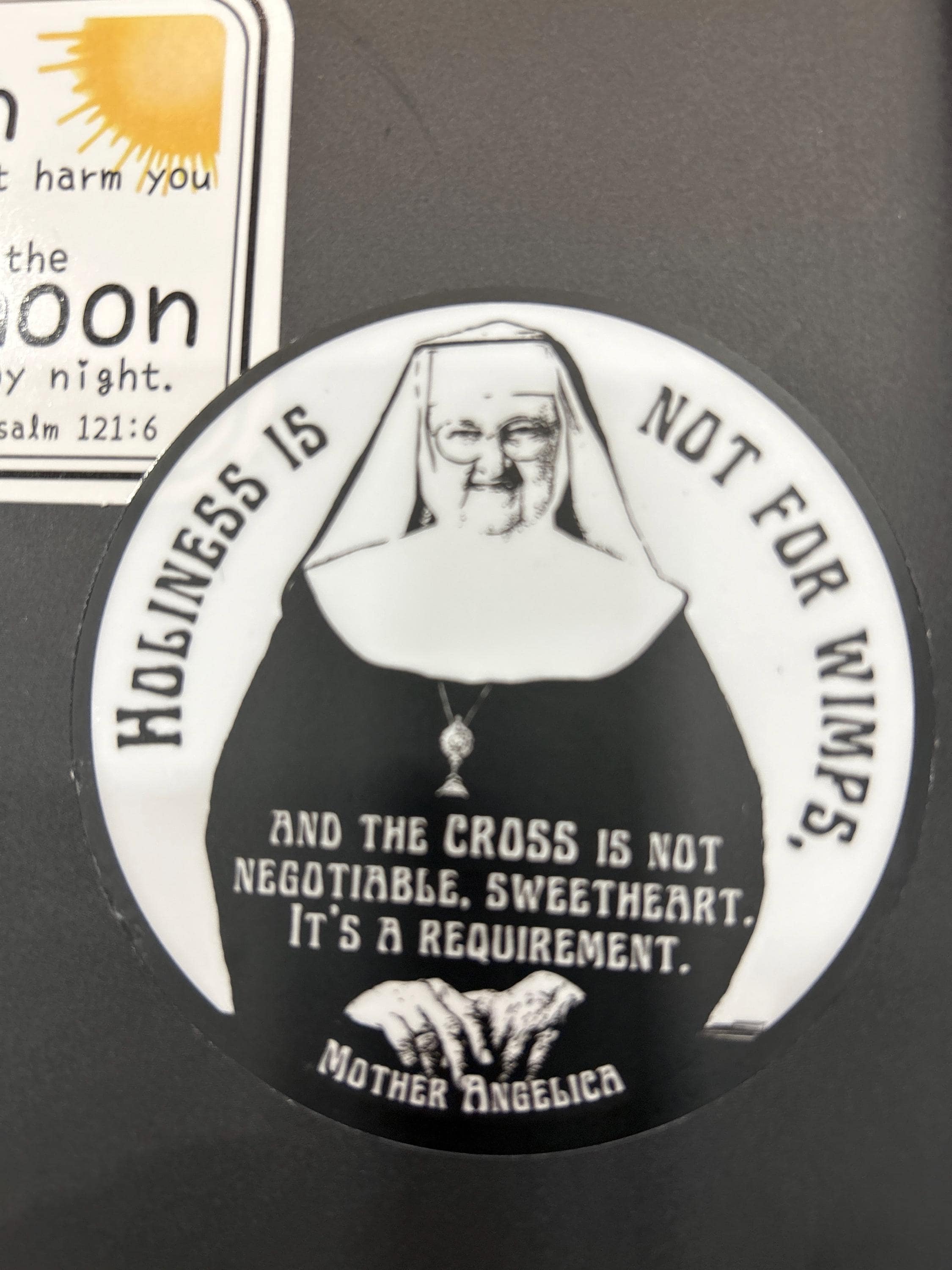 Mother Angelica quote, &quot;Holiness is not for wimps and the cross is not negotiable, sweetheart, it&#39;s a requirement.”| Circle Catholic sticker