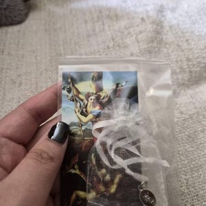 Sarah added a photo of their purchase