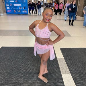 Ayanna added a photo of their purchase