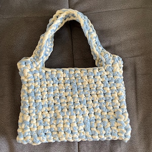 Naomi added a photo of their purchase