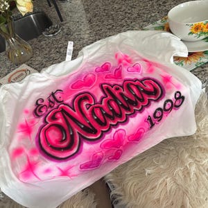 Nadia added a photo of their purchase