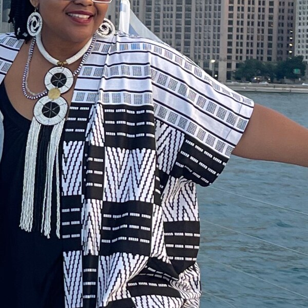 Asaba Top- Crew neck peplum top with one sided ruffle detail main image 1