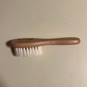 Leslie added a photo of their purchase