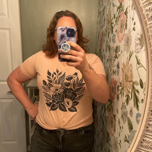 Sarah added a photo of their purchase