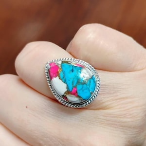 Sasha added a photo of their purchase