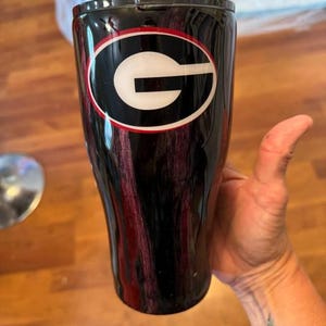 Kim added a photo of their purchase