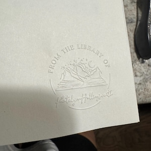 Katie added a photo of their purchase