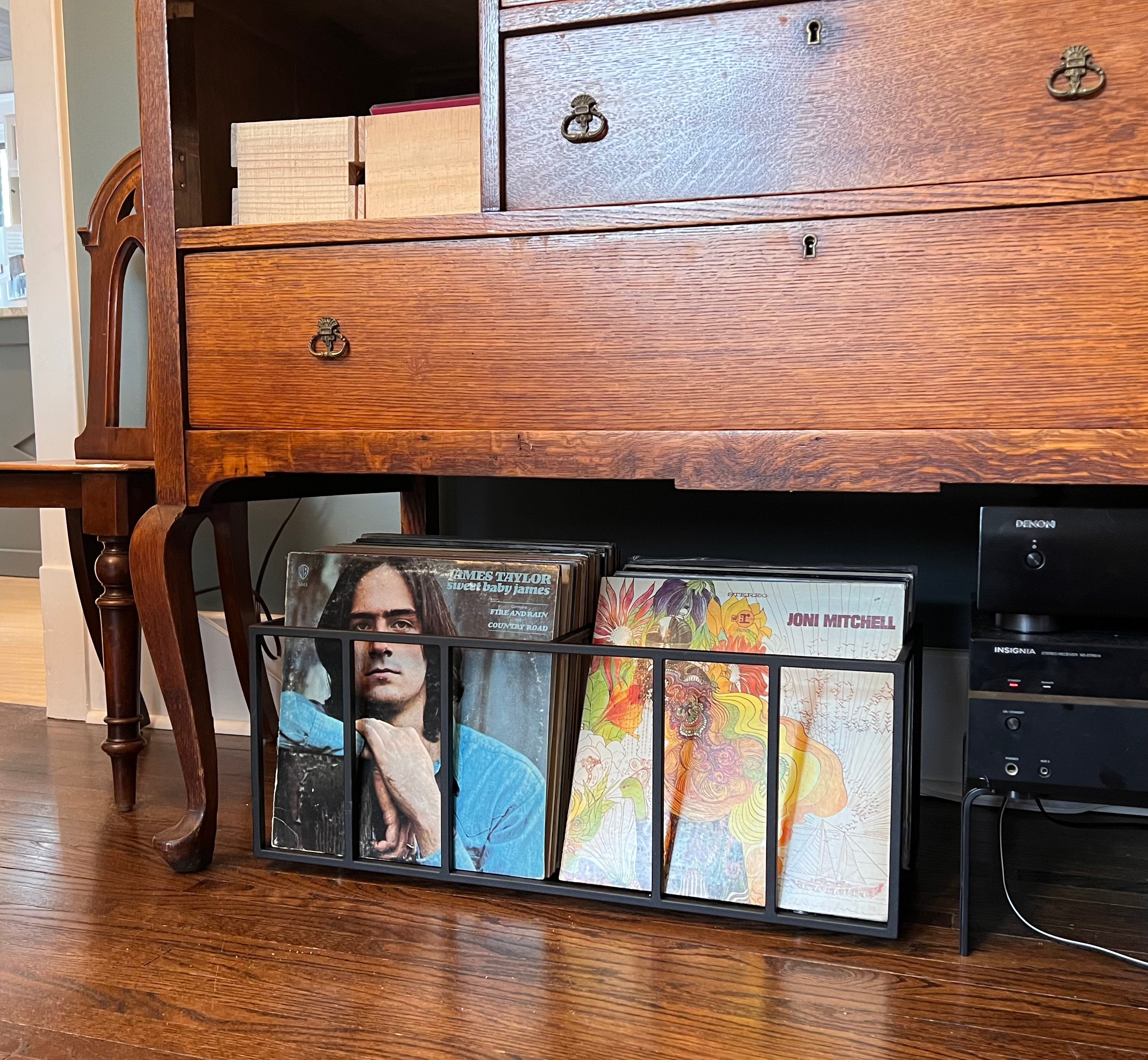 Black Atelier Article TWINS two-row vinyl record crate beneath a vintage cabinet.