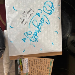 Kim added a photo of their purchase