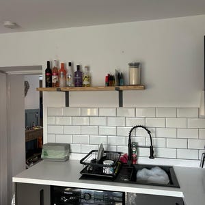 Claire added a photo of their purchase