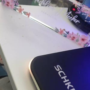 Madeline added a photo of their purchase