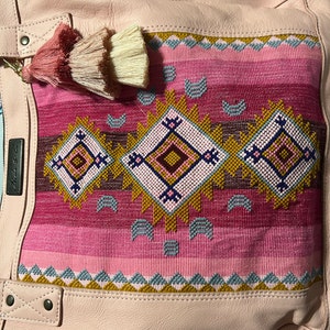 Samantha added a photo of their purchase