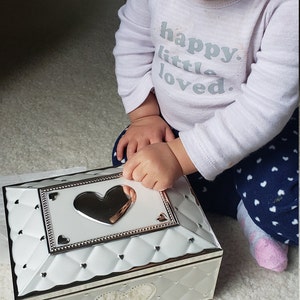 Lana added a photo of their purchase