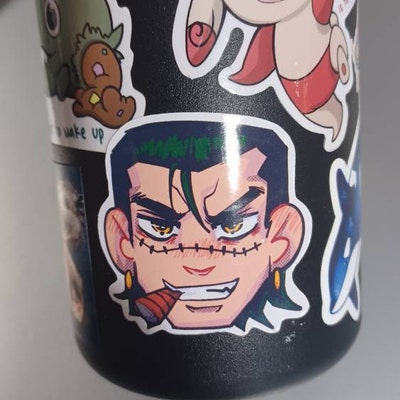 Donuts Katakuri Sticker inspired by One Piece anime featuring a detailed illustration with donut motifs