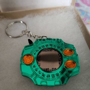 デジモンデジヴァイスがアクリルネックレスやキーホルダーに