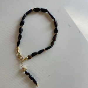 天然エチオピア産ブラックオパールブレスレット 7×5mm 16石 K18WGGP 天然エチオピア産ブラックオパールブレスレット 7×5mm 16石