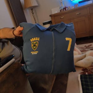 Aisha added a photo of their purchase
