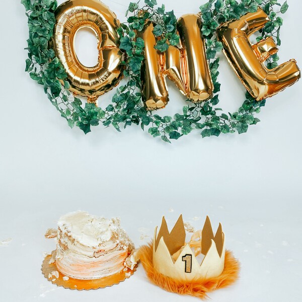 King of the wild things first birthday cake smash outfit in gold and black main image 0
