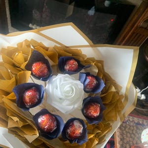 Nirmala added a photo of their purchase