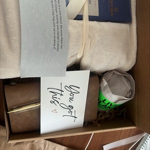 Joan added a photo of their purchase